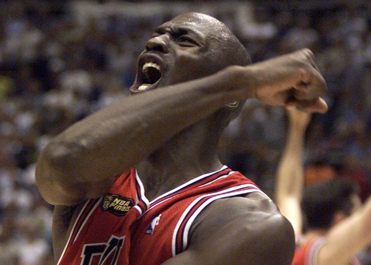 BULLS MICHAEL JORDAN CELEBRATES WINNING NBA CHAMPIONSHIP.