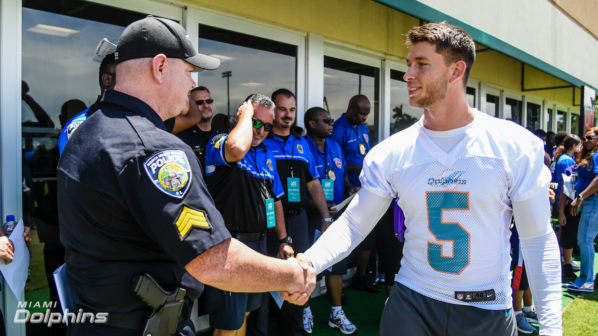 Miami Dolphins Kicker Greg Joseph meets with North Miami Beach Police Officer