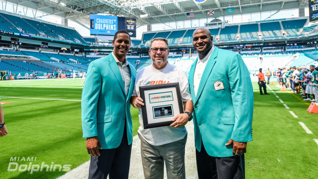 Miami Dolphins Play Football