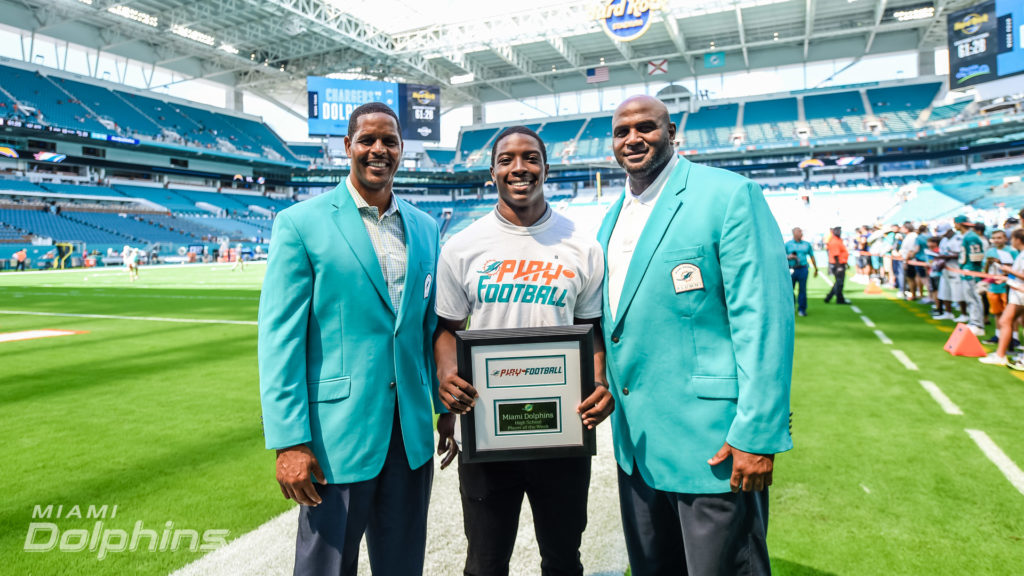 Miami Dolphins Play Football