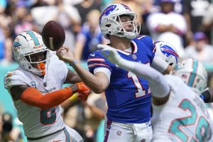 Dolphins Bills Lead Division